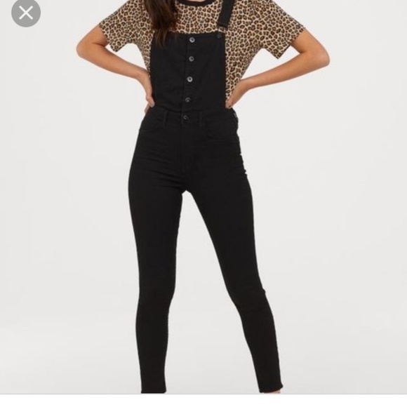 tight black overalls